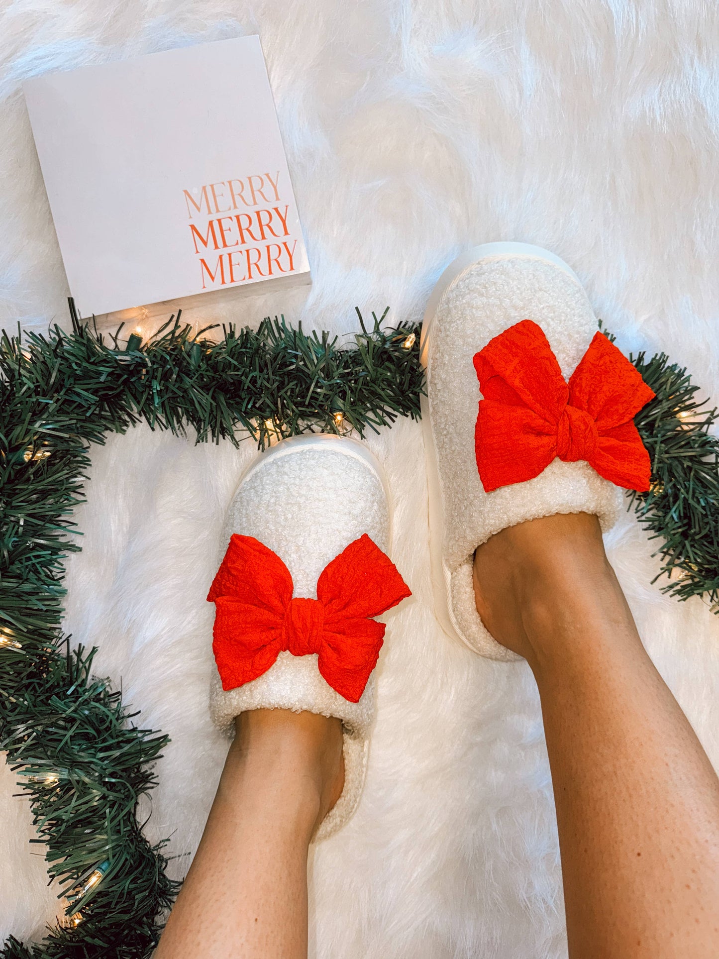 Red bow slippers