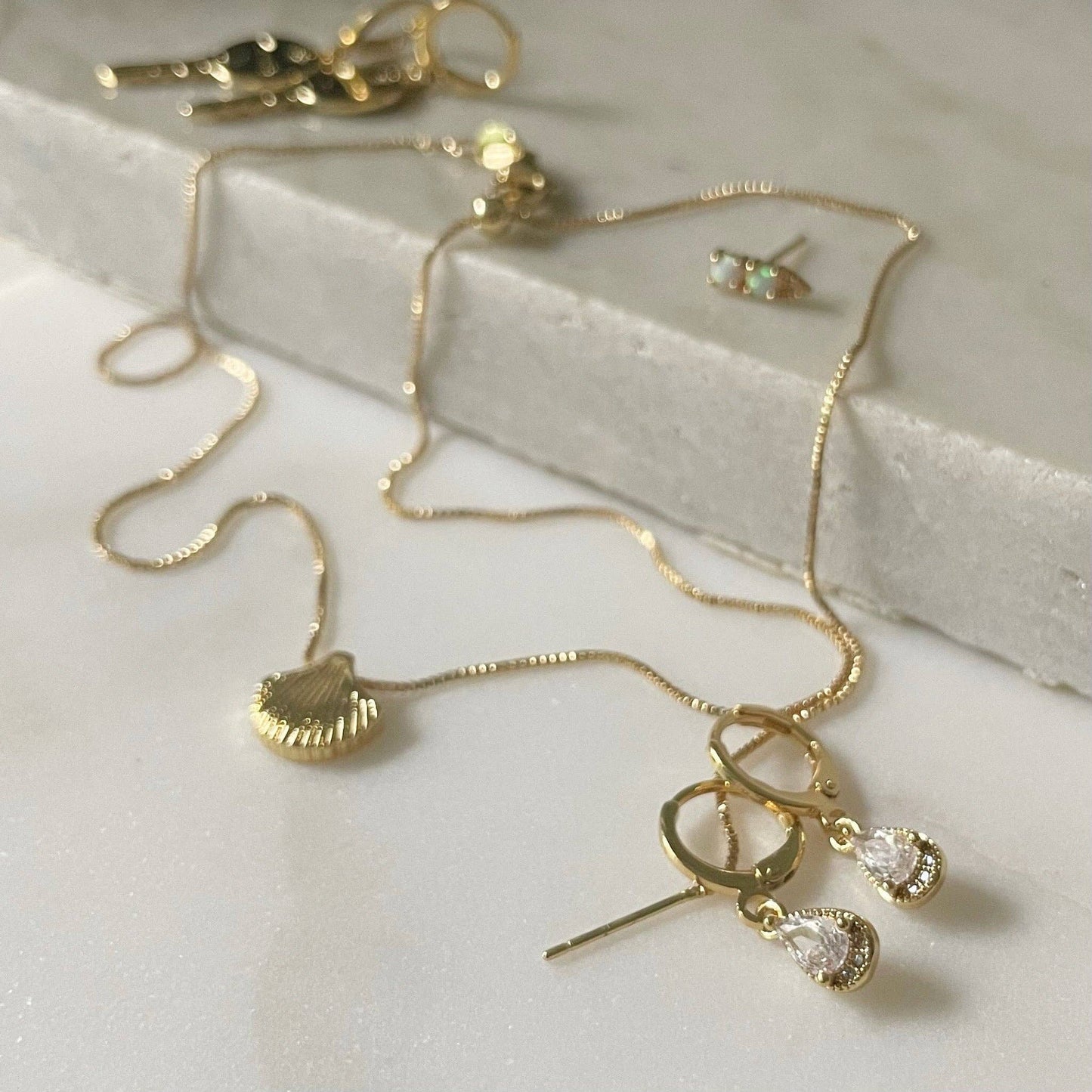 Save Your Tears Huggies. Gold Filled Drop CZ Earrings