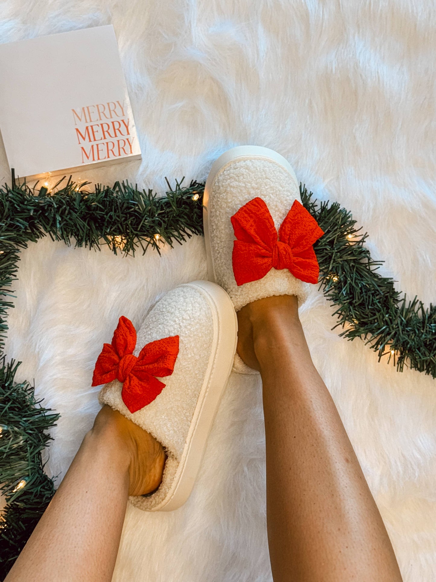 Red bow slippers
