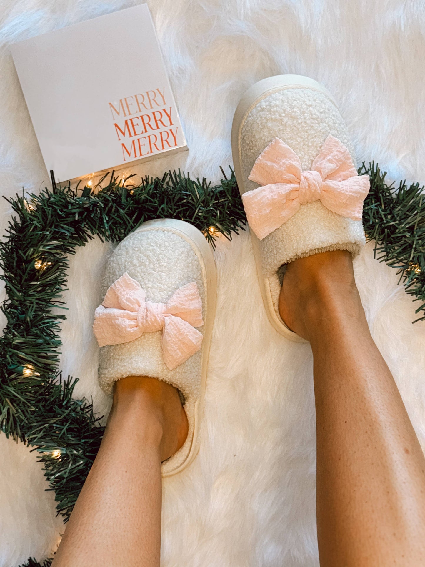 Red bow slippers