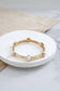 Jeweled Golden Bangle with semi precious stone dots: Shiny Gold - Pink Rose quartz