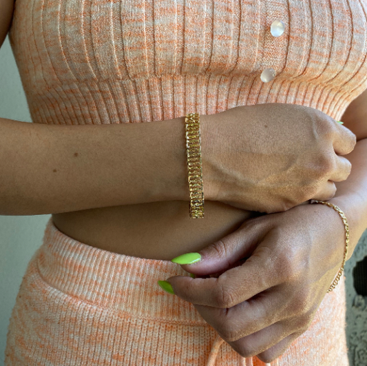 Gold Bracelet Featuring Fold Over Clasp